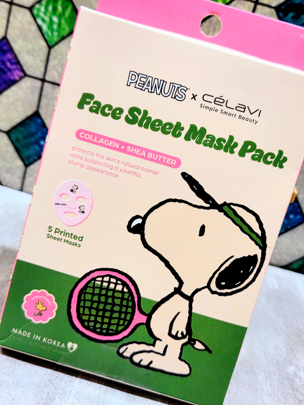 Snoopy Face Sheet Mask Pack with 5 printed sheet masks, green and pink graphics
