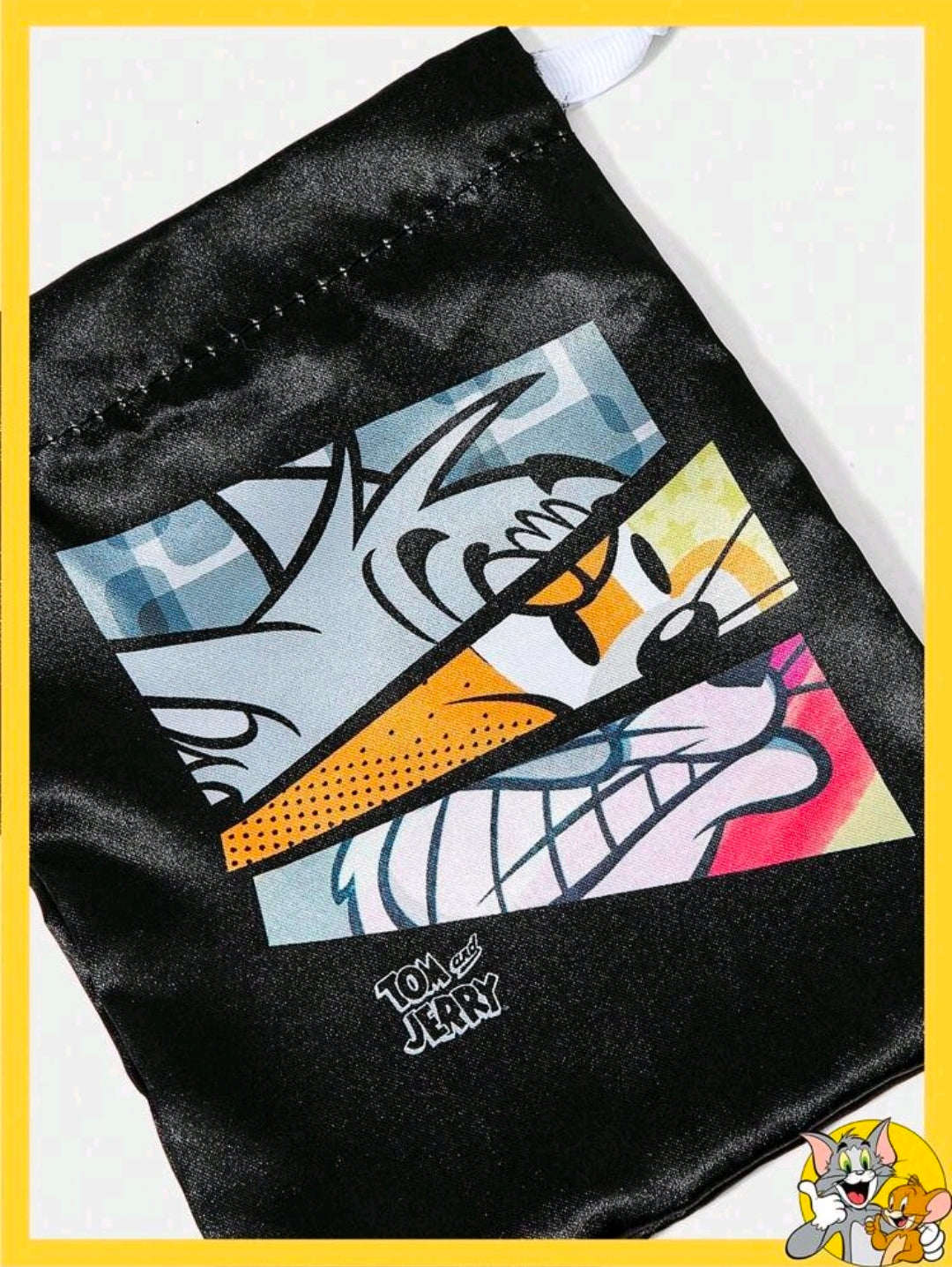 Black satin pouch with Tom & Jerry character graphic