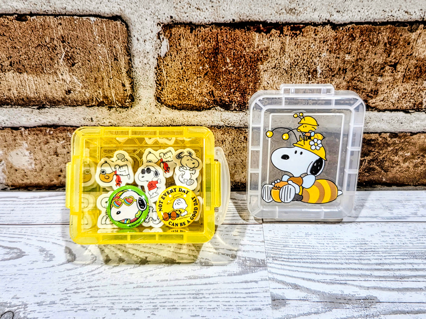 Yellow and clear desktop organizer set with Snoopy-themed erasers and pins