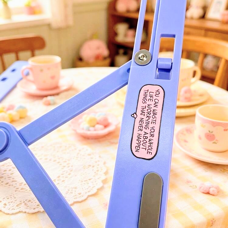 Purple foldable laptop stand arm with Snoopy graphic and adjustable bracket