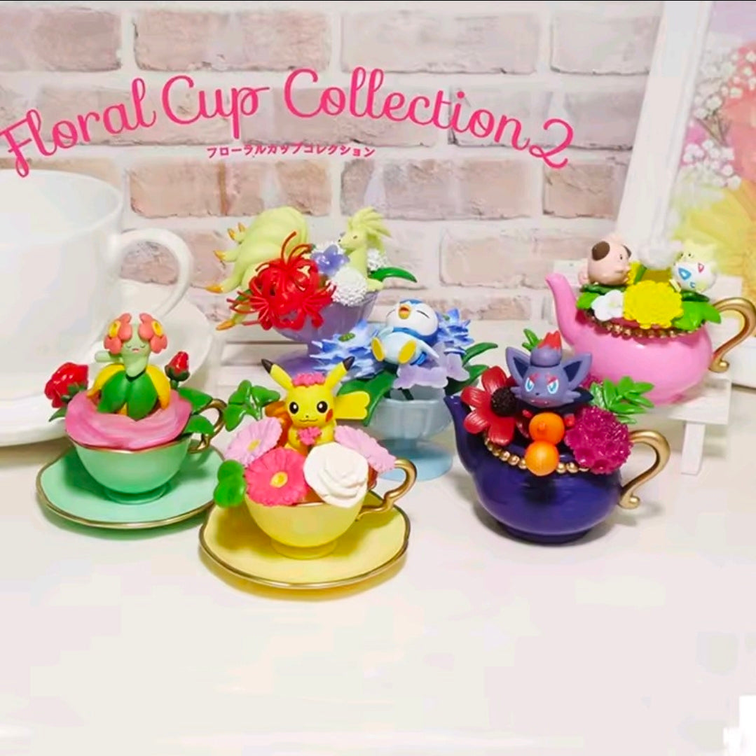 Floral Cup Collection mini figure display with multiple character teacups on a tray