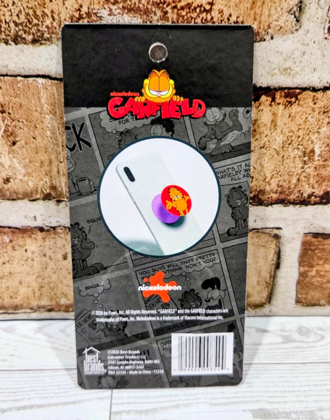 Garfield phone grip holder back packaging with white pop socket and barcode label.
