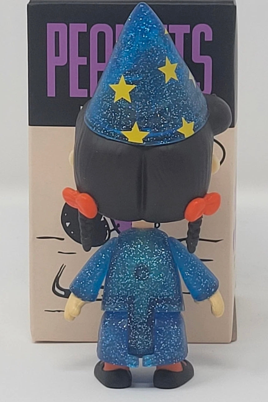 Halloween vinyl figure in glitter blue outfit with a blue star wizard hat and black shoes