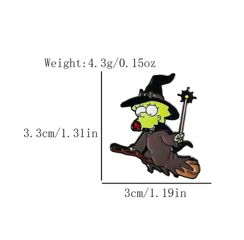 Witch riding a broom enamel pin with black hat and wand