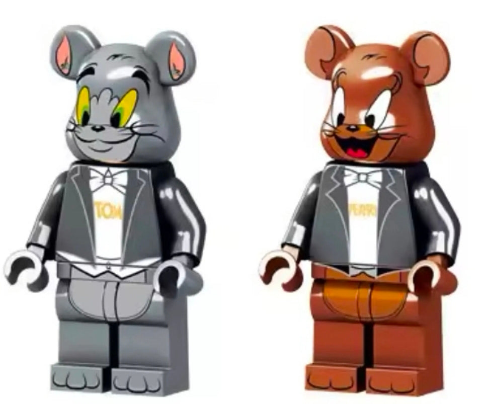 Bearbrick-style keychain figures: gray Tom in black outfit, brown Jerry in brown outfit