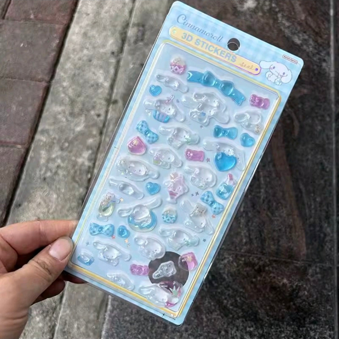 3D acrylic sticker set with pastel blue and pink cute character charms on a card