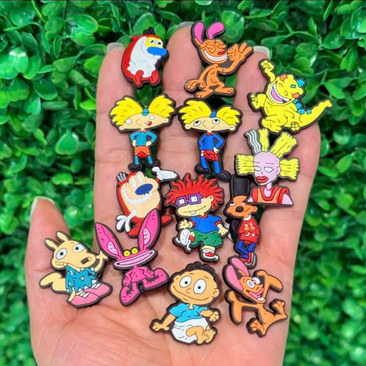 13-piece PVC cartoon shoe bag charm set with small multicolor character charms