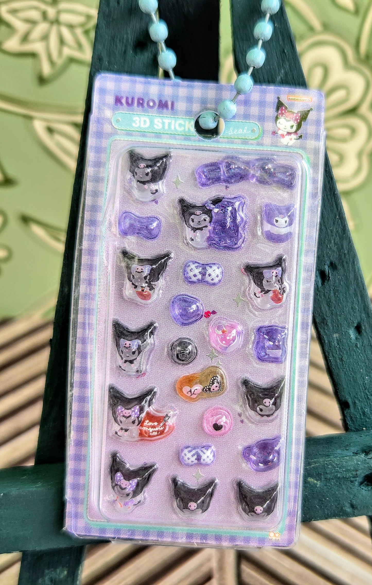 Kuromi 3D sticker keychain set card in clear blister with multiple purple cat charms.