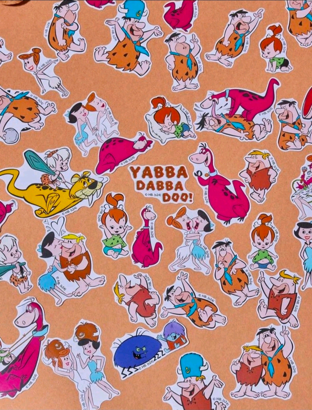 Assorted Flintstones character stickers, including Dino and Yabba Dabba Doo