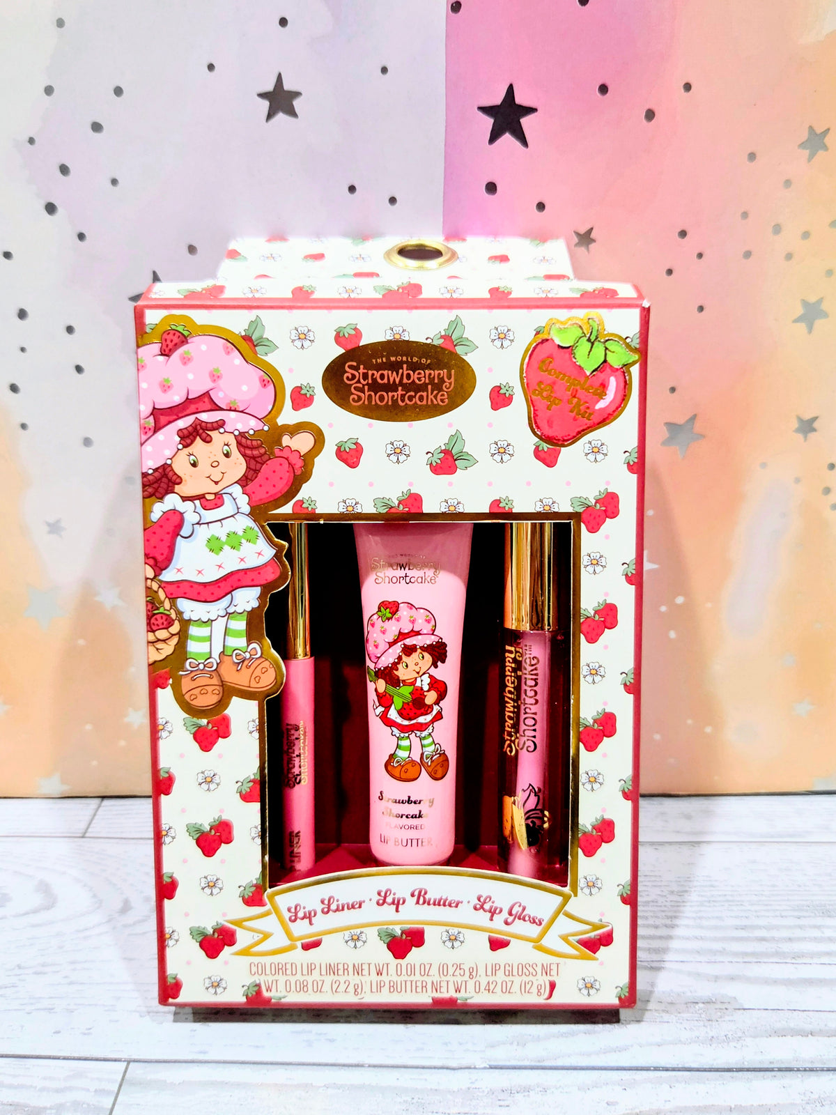 Lip kit gift box with window showing lip liner, lip butter, and lip gloss
