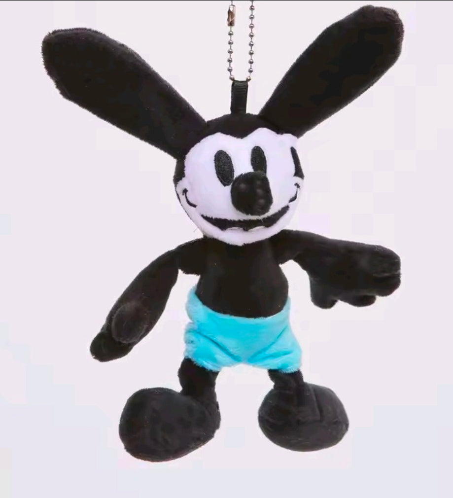 Oswald Lucky Rabbit mini plush keychain with black ears, white face, blue shorts