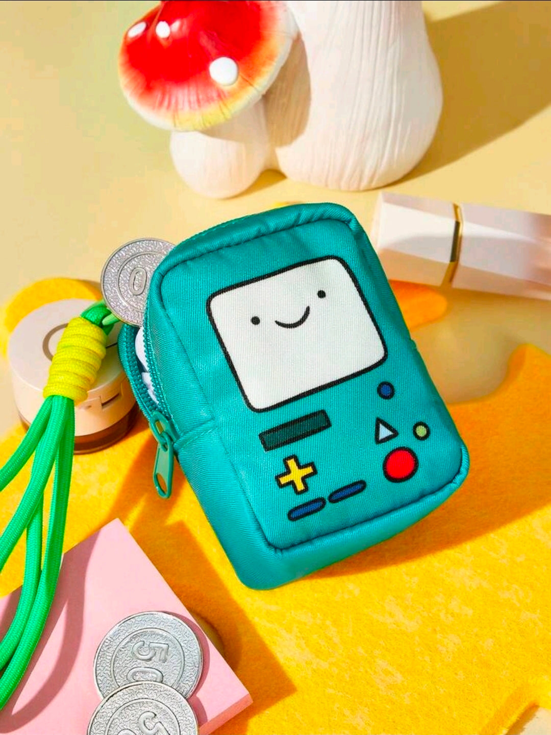 Teal mini robot pouch with zipper, embroidered face, and green strap loop