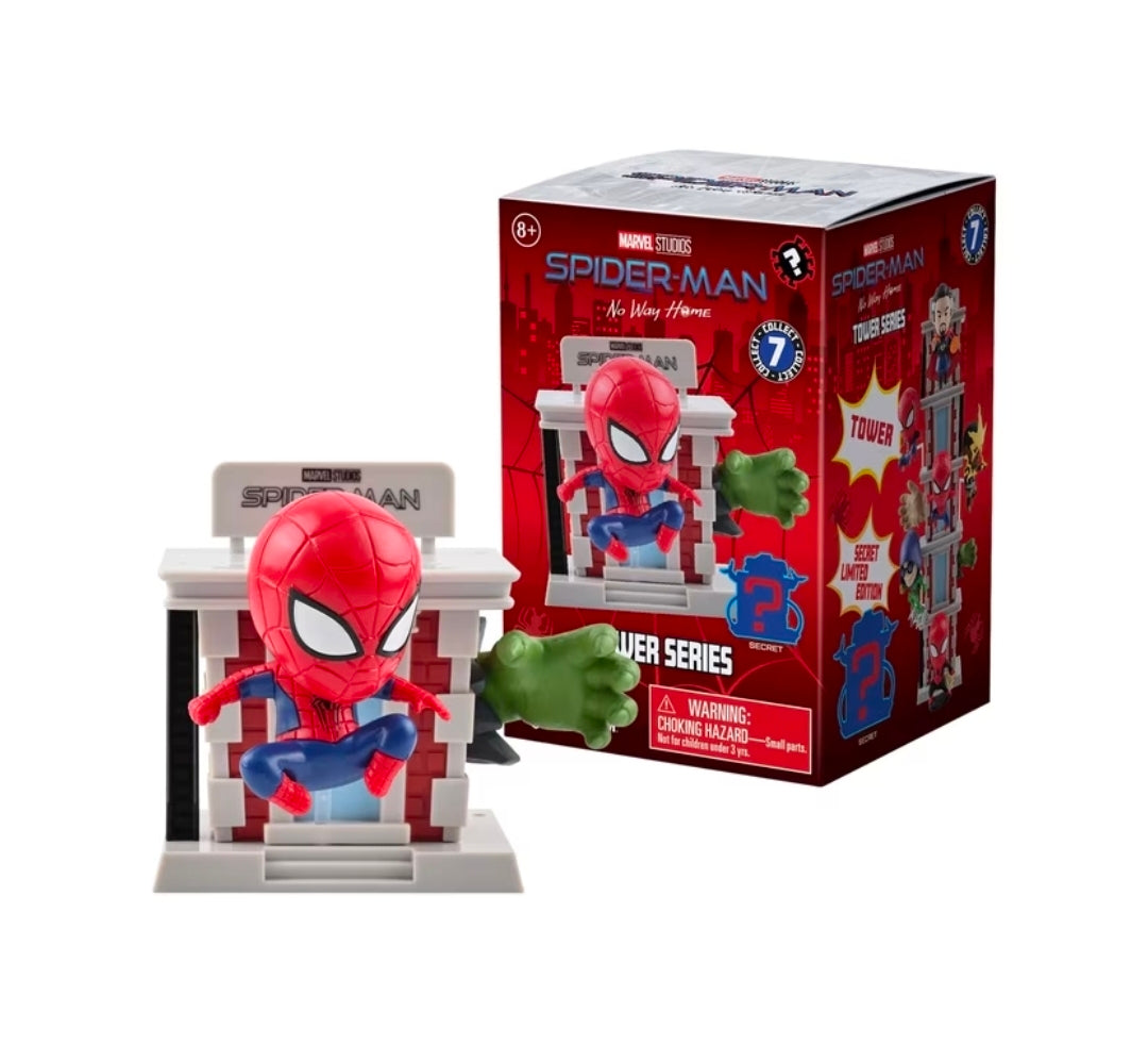 Spider-Man tower blind box figure with red mask holding green accessory beside retail box