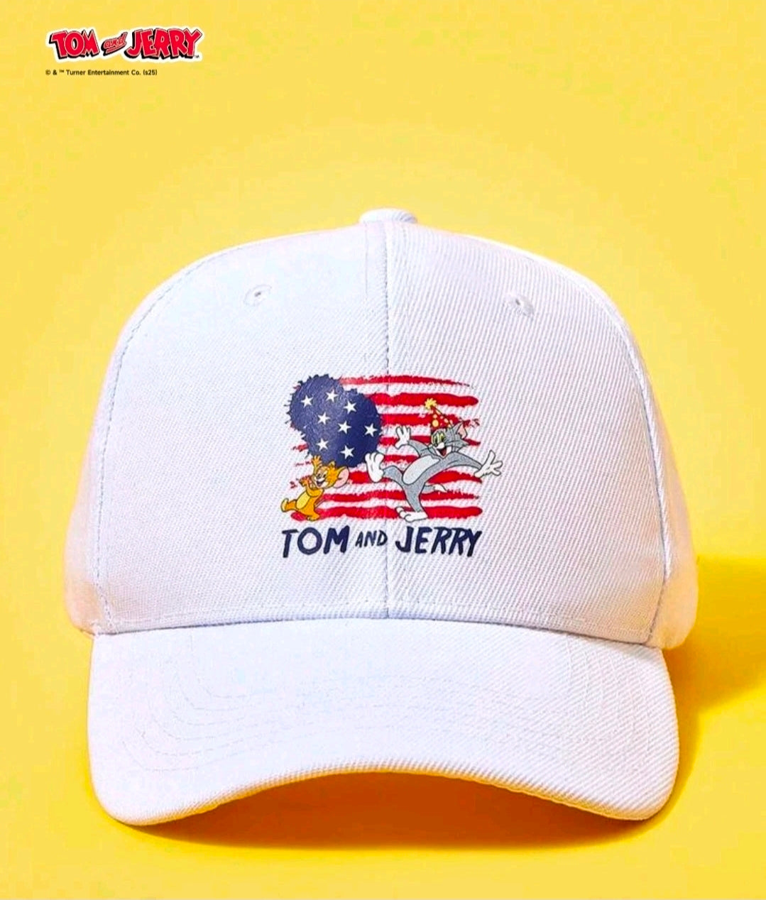 White baseball cap with centered Tom and Jerry patriotic US flag graphic