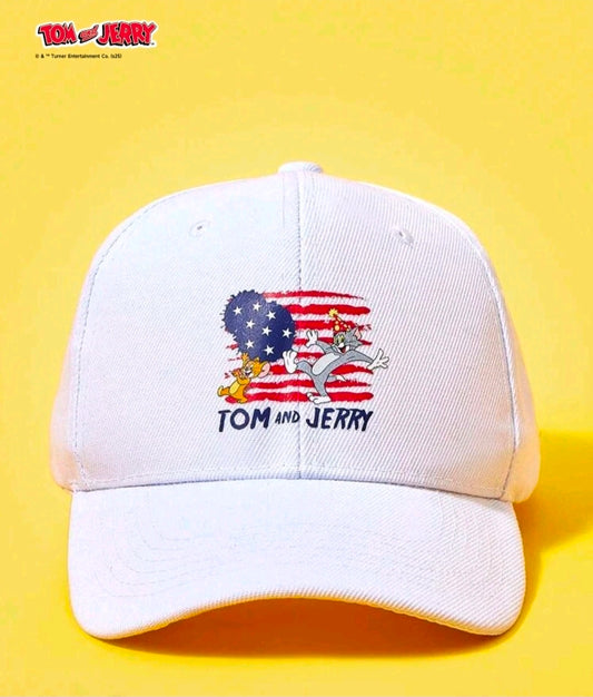 White baseball cap with centered Tom and Jerry patriotic US flag graphic