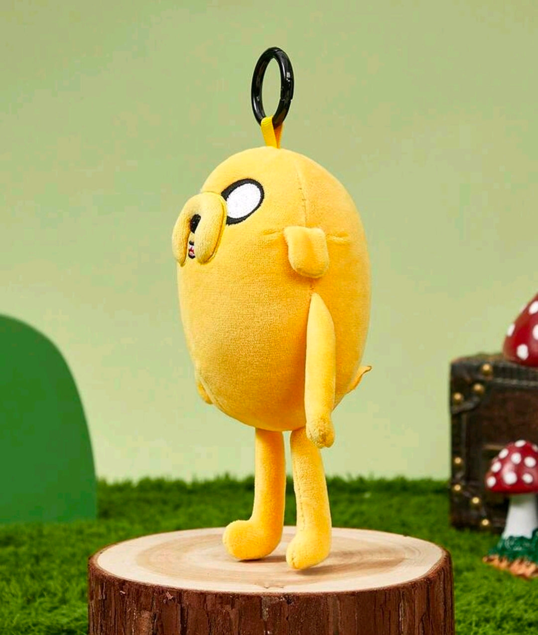Yellow Jake the Dog plush bag charm keychain, front view with black keyring loop.