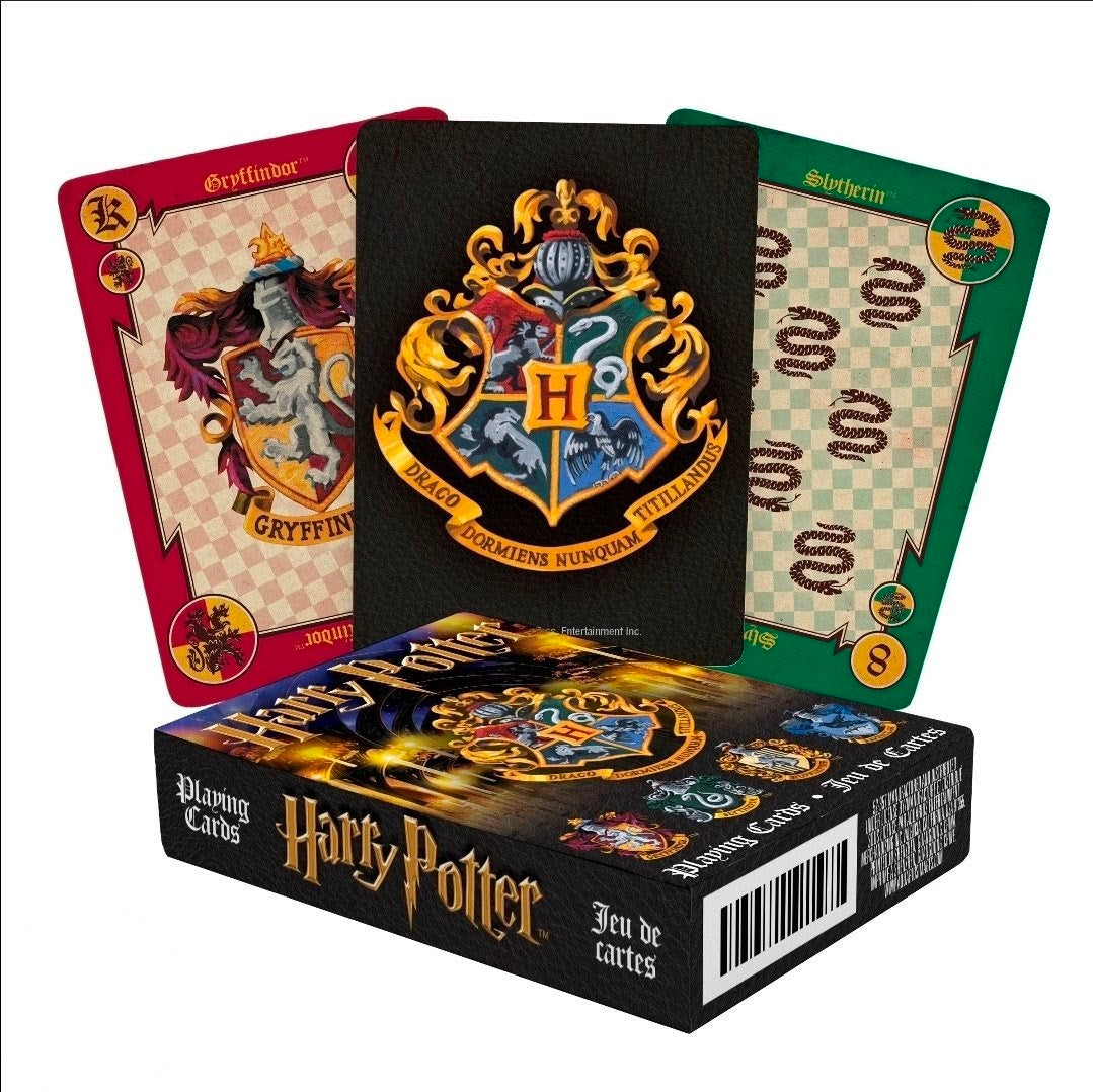 Playing cards deck with three house cards showing Gryffindor, Slytherin, and Ravenclaw crests