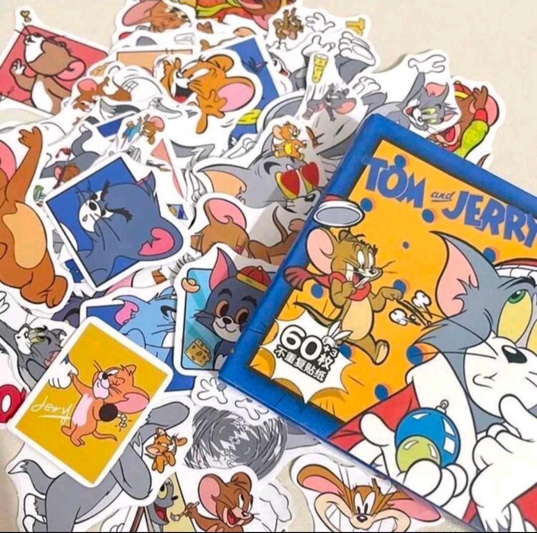 Tom and Jerry sticker pack box with many loose stickers featuring various characters