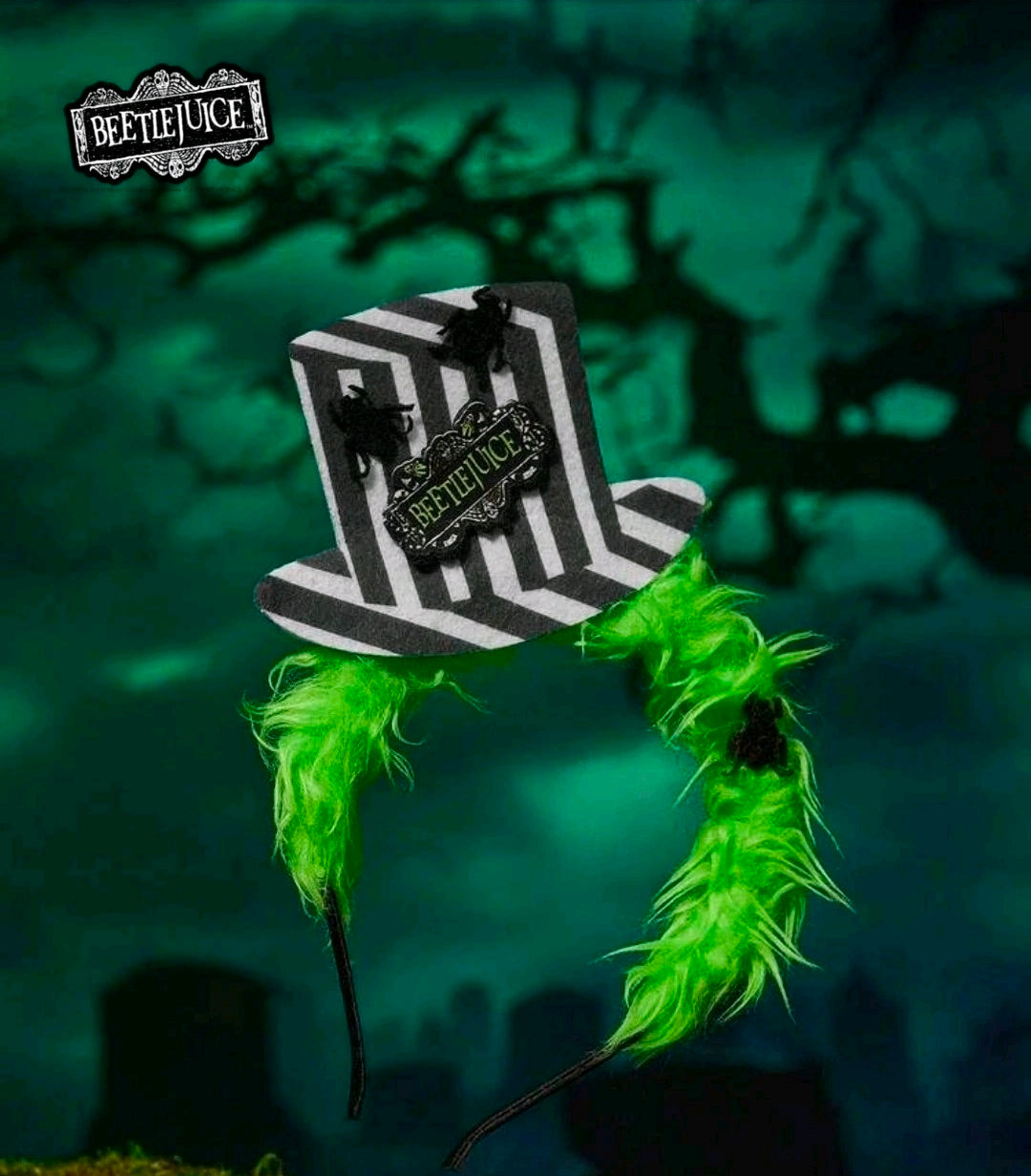 Green fur Halloween headband with striped mini top hat, long feather trim, Beetlejuice patch