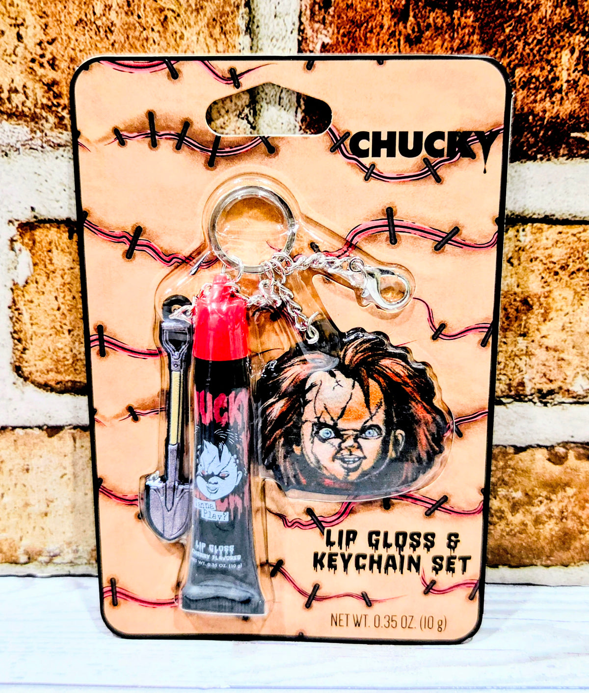 Chucky lip gloss and keychain set blister pack with lip gloss tubes and keychain