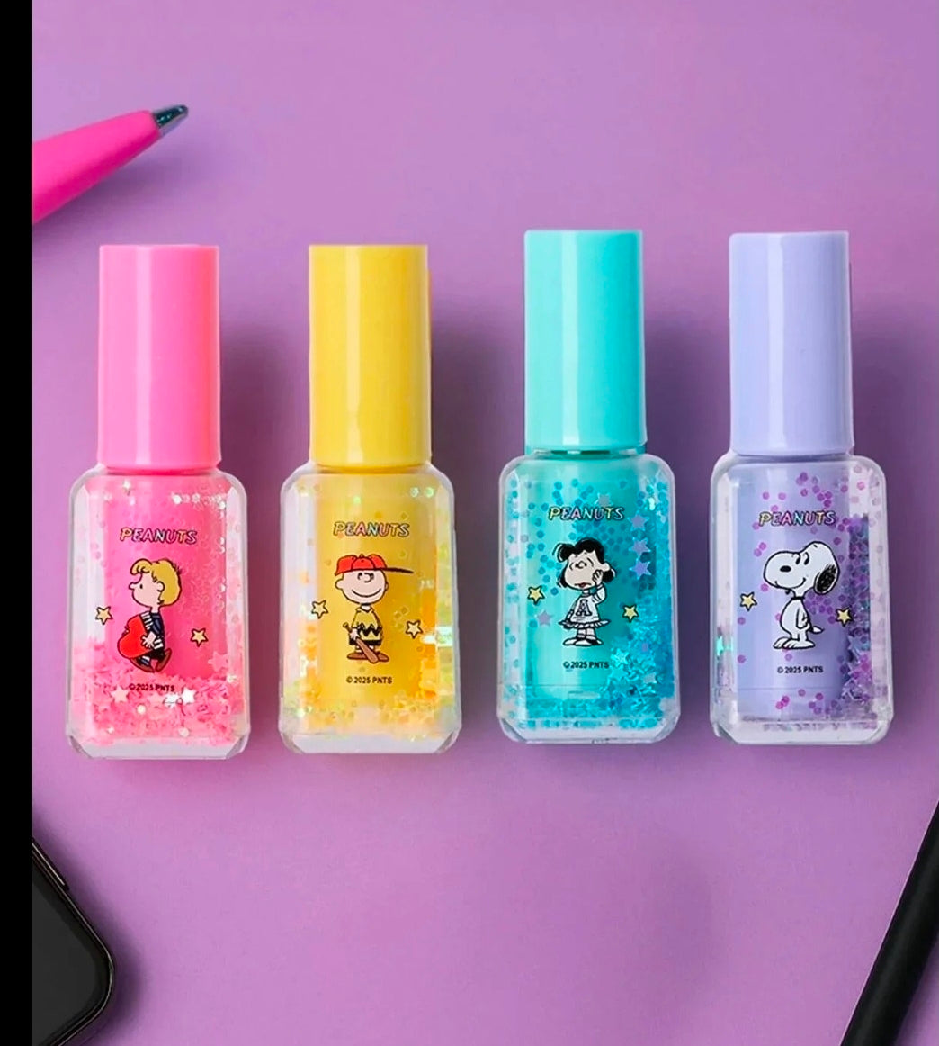 Peanuts glitter highlighter bottles in pink, yellow, teal, and lavender, lined up.