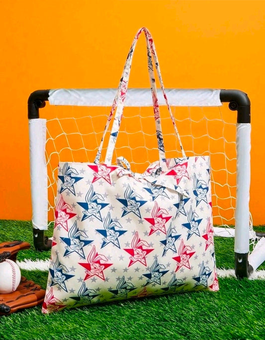 Patriotic tote bag with star and cartoon bunny print and long carry handles