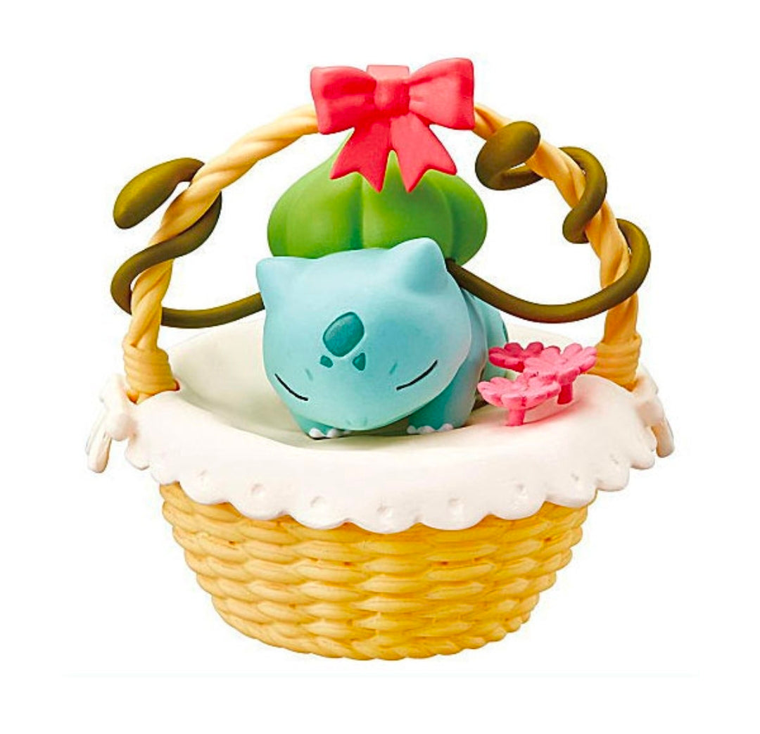Vileplume nap basket figure with green body, red bow, and pink flower accessory.