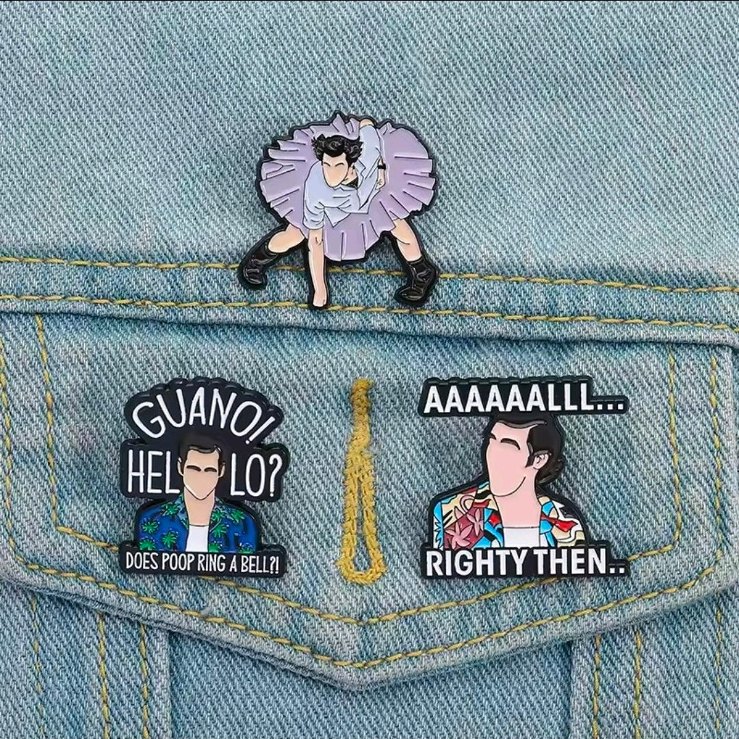 Enamel pins on denim pocket: purple cheering pose, “GUANO! HELLO?”, “RIGHTY THEN..”