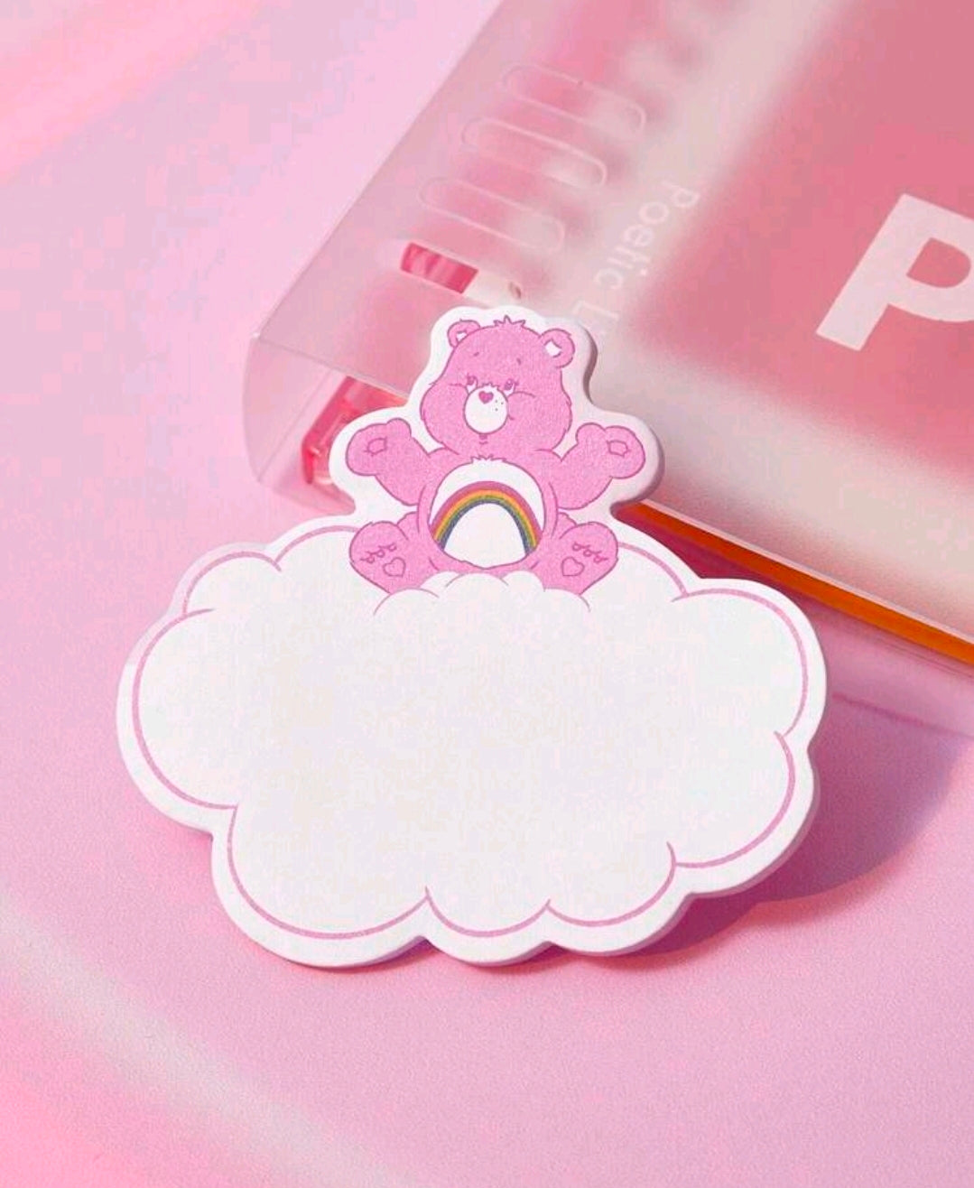 Cloud-shaped sticky note with Care Bears bear mascot on pink backing