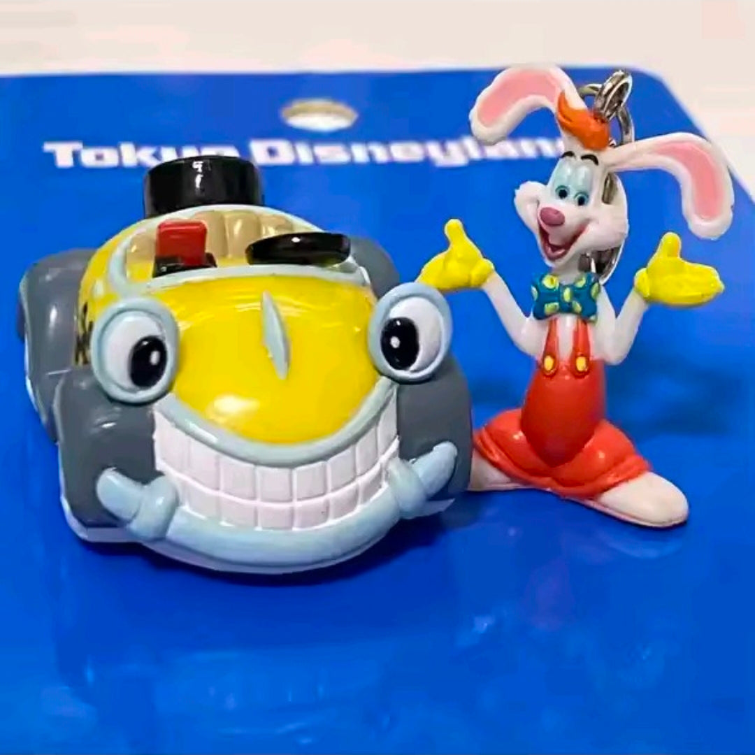 Benny Cab charm keychain with yellow-and-gray toy cab and white-eared rabbit charm