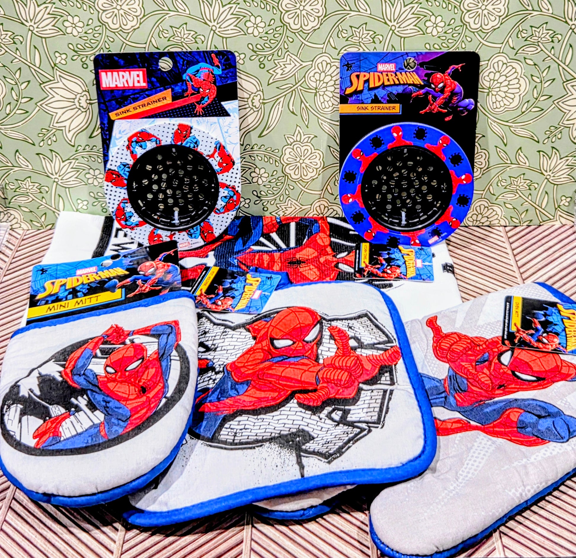 Spider-Man kitchen towel and mitt set with red-and-blue character graphics
