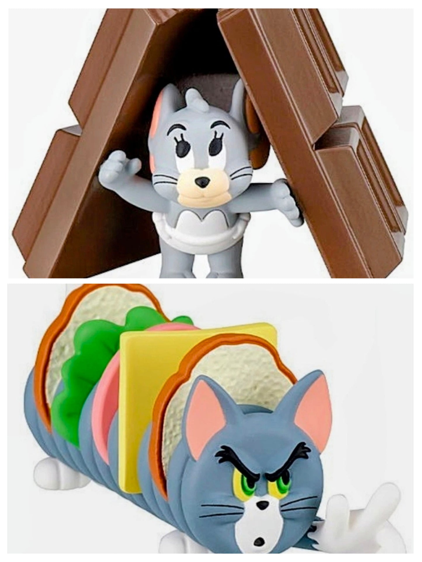 White cat figure in brown chocolate arch; blue cat figure in striped capsule stack