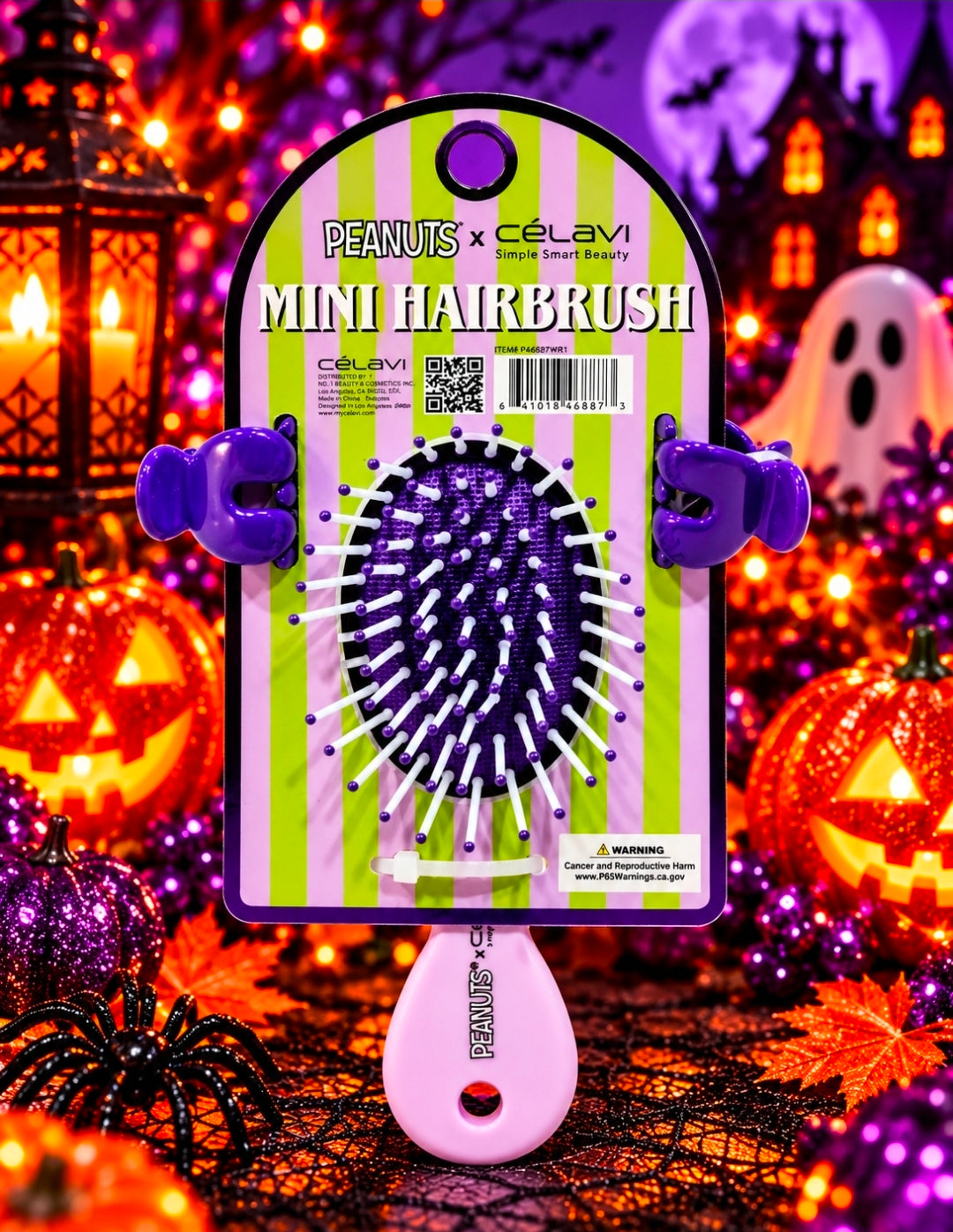 Mini hairbrush set card with Peanuts x Celavi brush and purple hair clips.