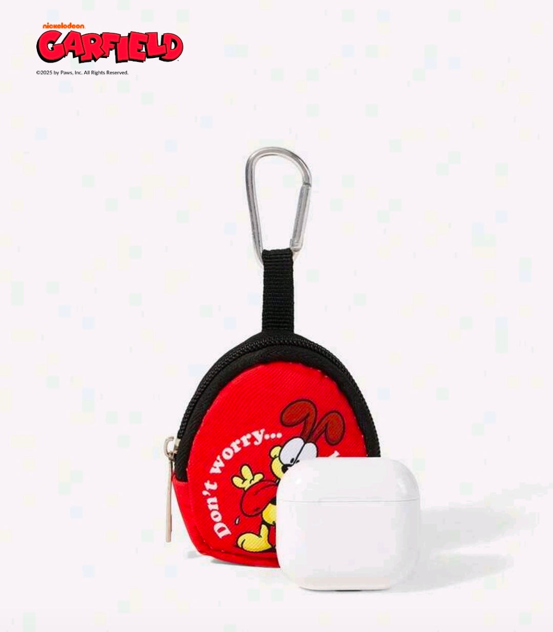 Red Garfield coin pouch keychain beside white earbuds case; black zipper and ring
