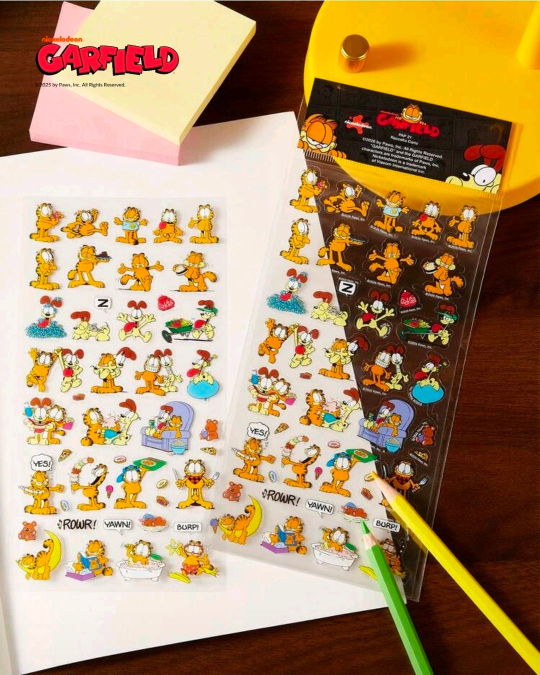 Garfield clear-backed sticker sheet with many character stickers, plus matching sticker pack