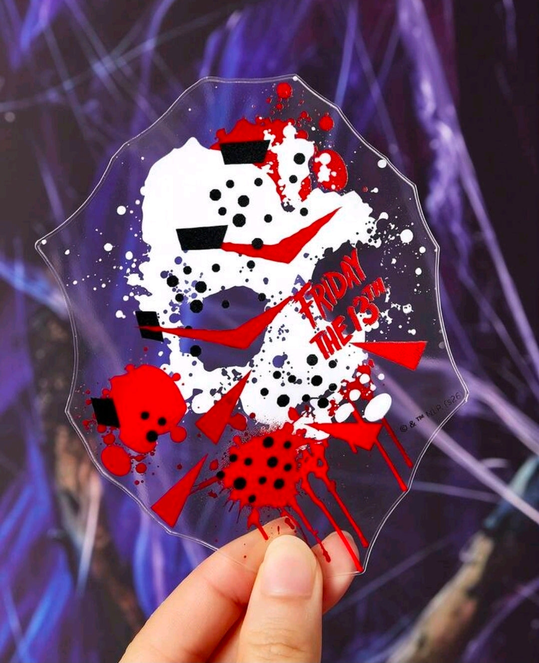 Clear nail sticker sheet with Jason-style hockey mask and splatter graphics
