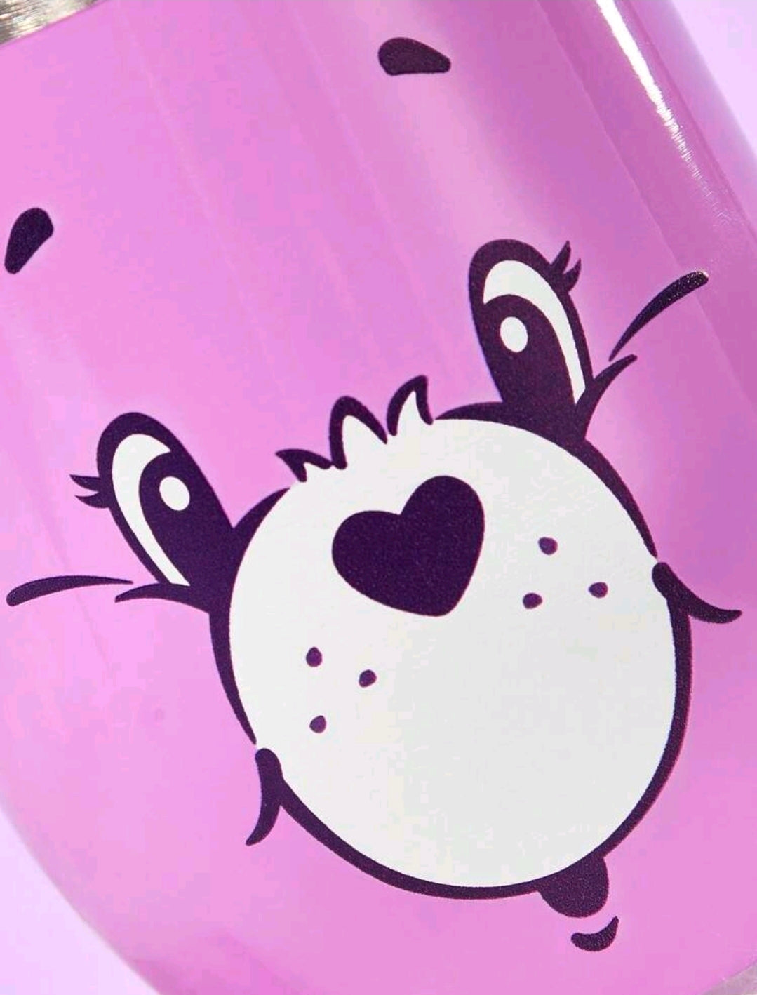 Pink stainless steel insulated tumbler with Cheer Bear face graphic on side