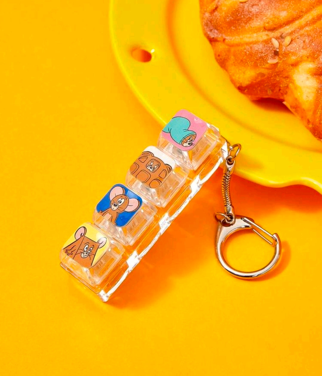 Cartoon keyboard fidget keychain with clear plastic clicker strip and metal keyring