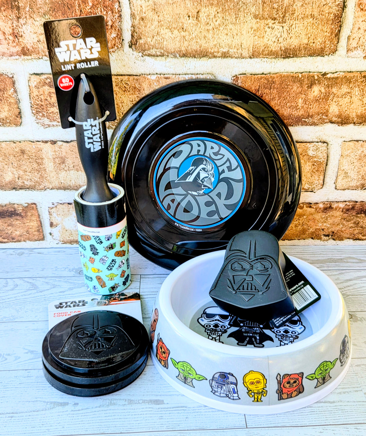 Star Wars pet gift set: black and white bowls, scoop, and snack tin