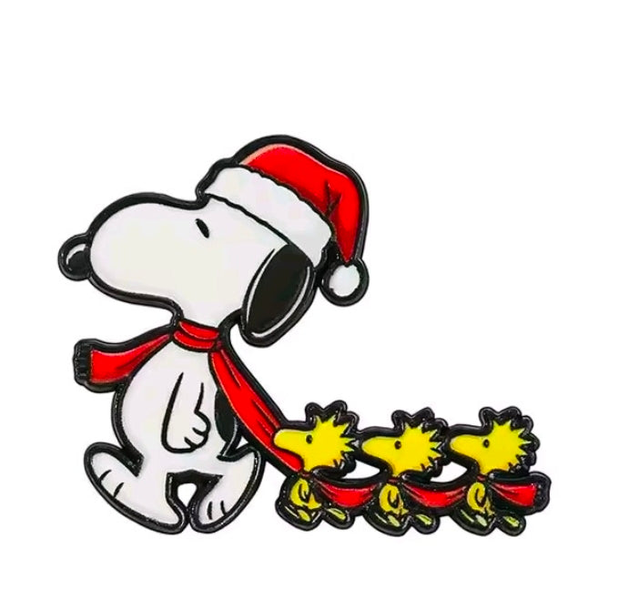 Snoopy enamel pin in Santa hat, walking with three star ornaments
