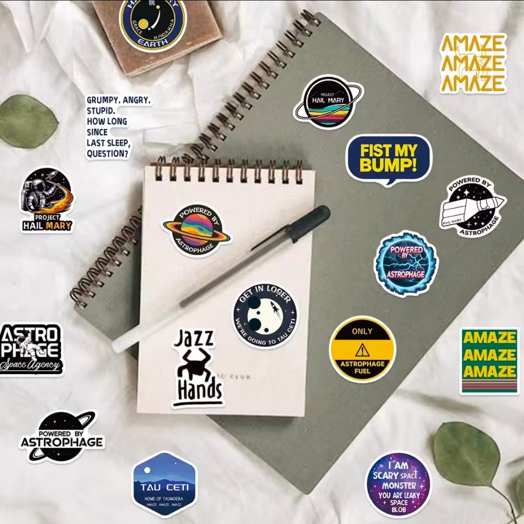 Space vinyl sticker pack with astronaut, planet, and character emblems in circles and stars