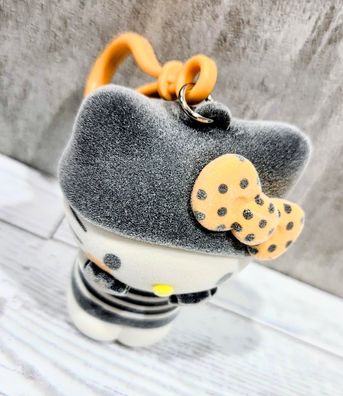 Flocked grey felt cat bag clip/hanger with orange loop and yellow charm