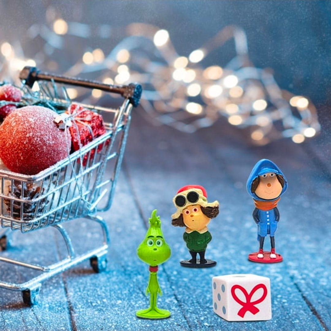 Grinch-themed mini figurines on display, green and blue characters with a small gift box