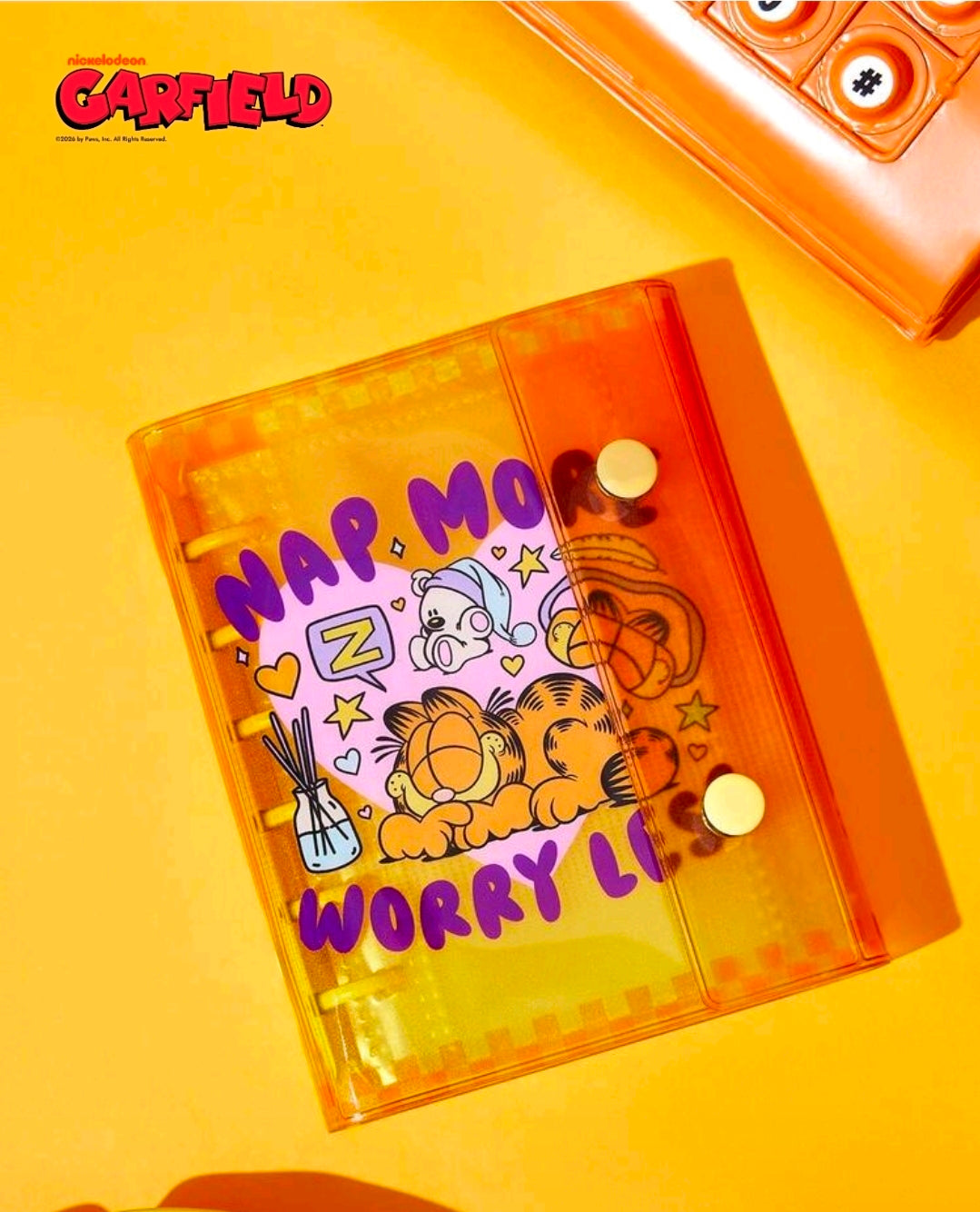 A7 sticker photo album planner with translucent orange cover and cartoon sticker text