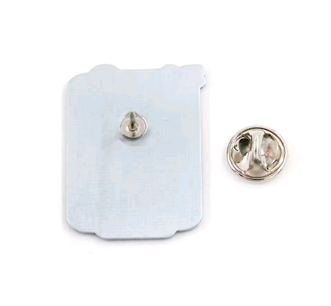 Halloween Safety enamel pin showing Michael Myers holding a phone with kids