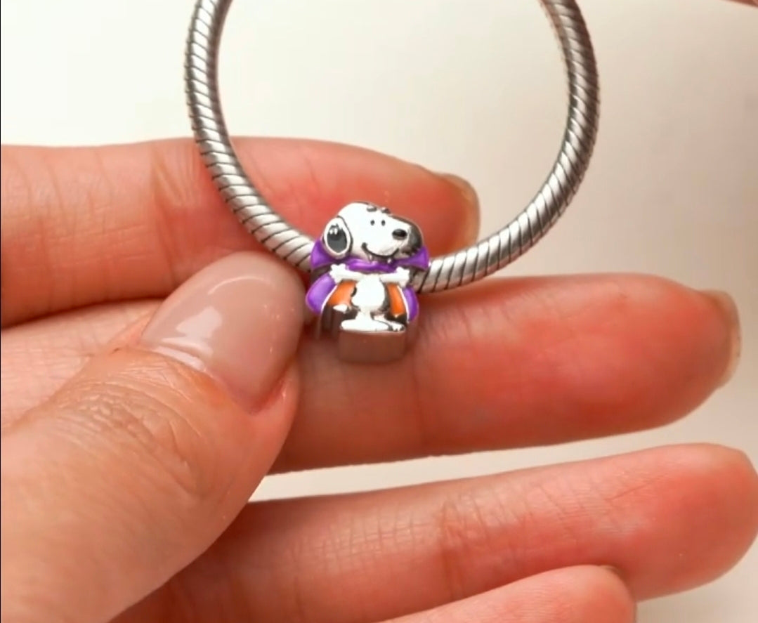 Snoopy vampire charm bead on silver snake bracelet, purple cape detail