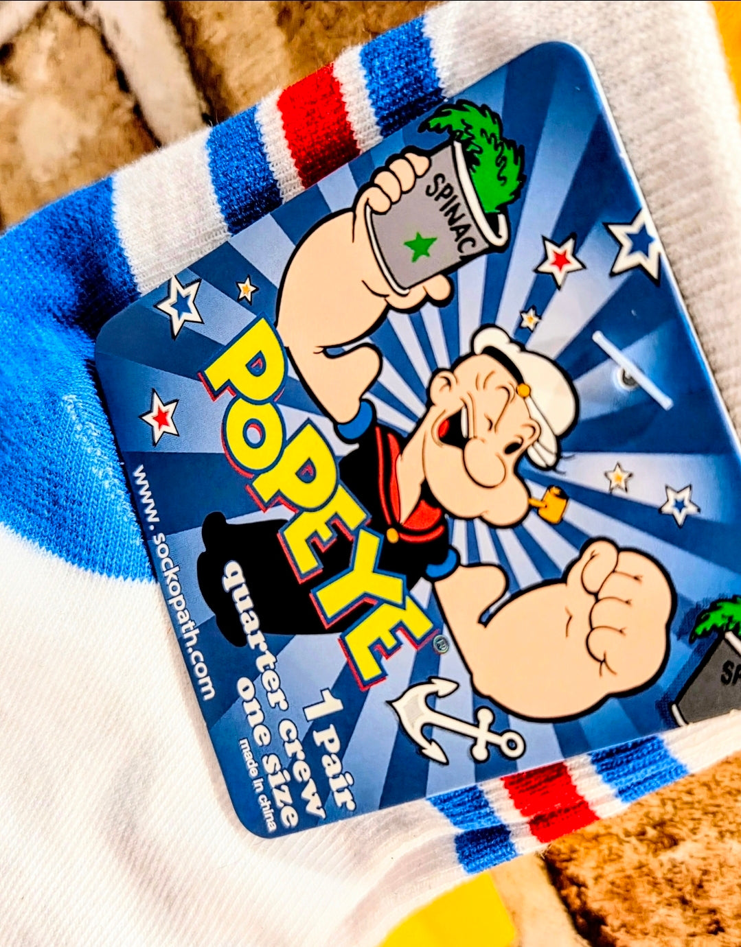 Quarter crew socks with Popeye graphic panel and blue, white, red stripe bands