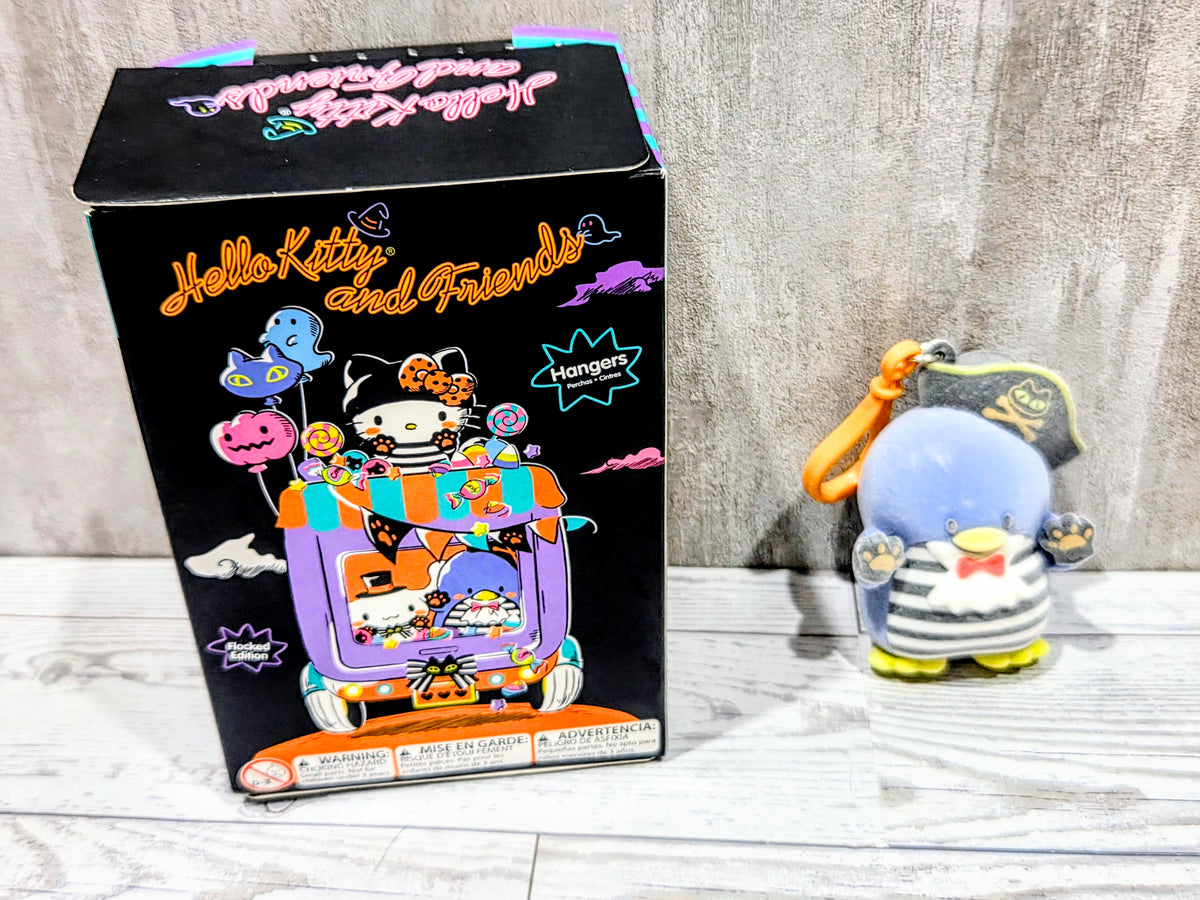 Tuxedo Sam pirate-themed plush bag clip shown with retail box on a shelf