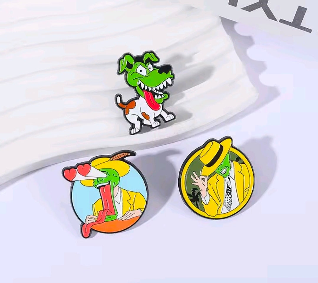 3-piece enamel pin set with three round cartoon character pins on a white card