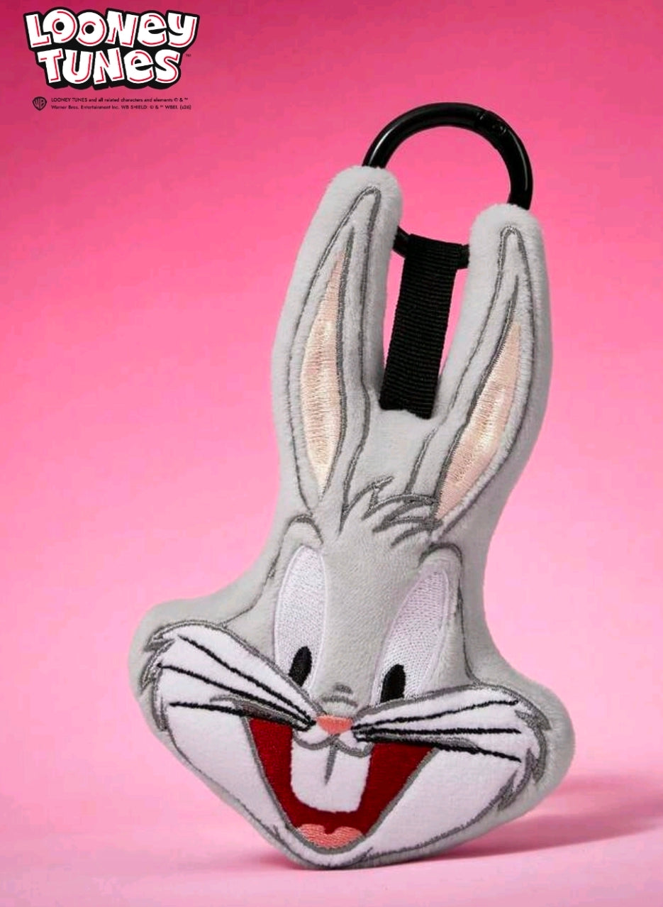 Gray plush rabbit face keychain charm with black loop and red-open mouth, upright ears